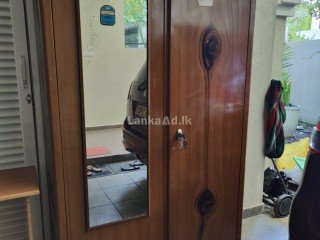 Two door Steel Wardrobe with a mirror in good condition